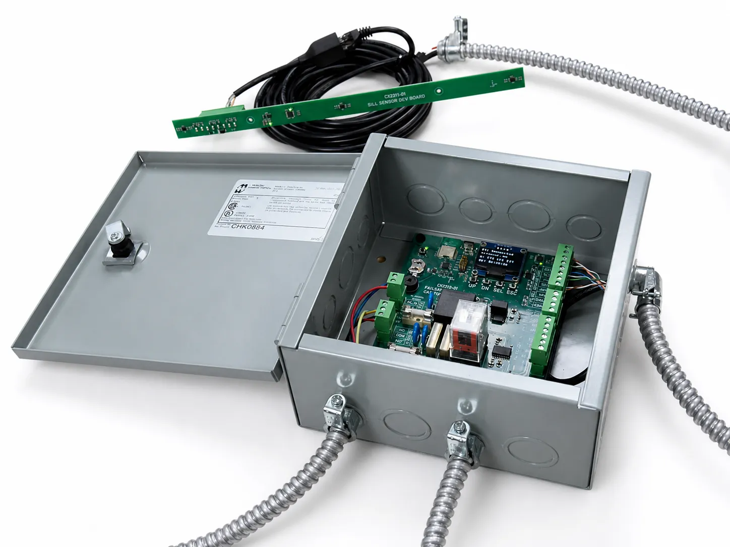 FailSafe Alignment System hardware: the car-top control board in its enclosure alongside the sill-mounted sensor strip