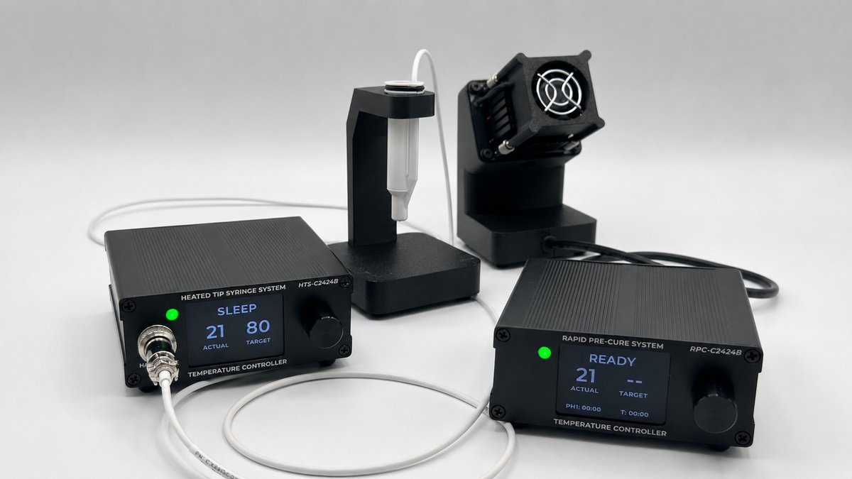 Croxel Precision Thermal product family: the HTS Heated Tip Syringe System and the RPC Rapid PreCure System shown together