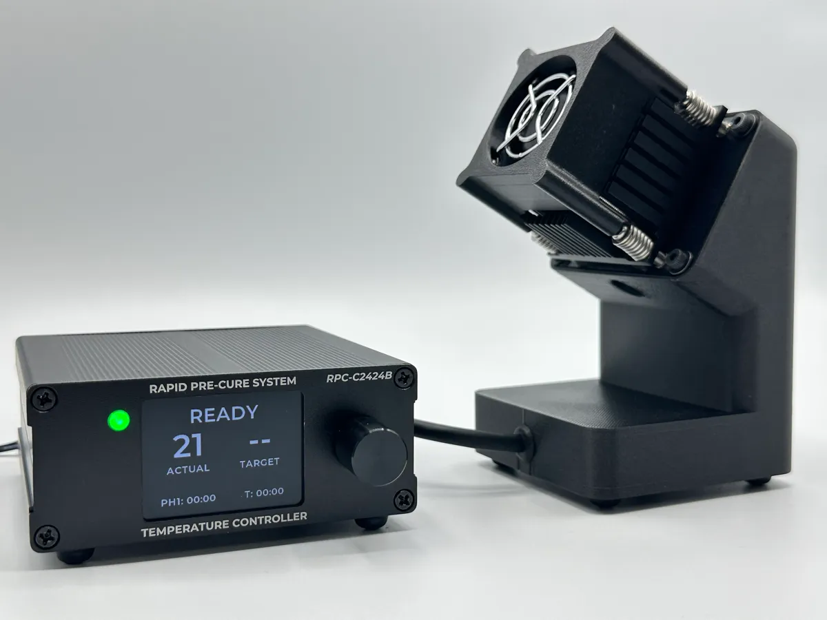 Croxel RPC Rapid PreCure System powered on, with controller display showing recipe phase and syringe heater/cooler unit ready